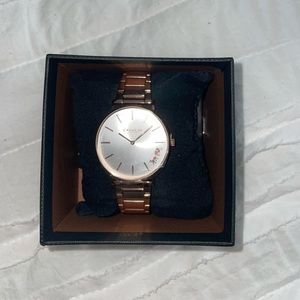 Rose gold Coach watch